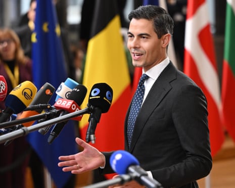 Dutch prime minister Rob Jetten speaks with the media as he arrives for the EU summit at the European Council building in Brussels.