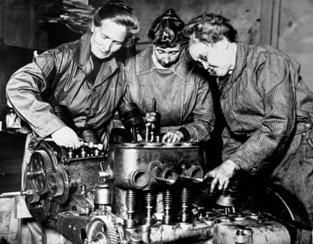 Auto mechanics repair an engine, Los Angeles, California, c1915–1920.