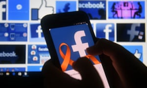 Mobile phone with Facebook logo