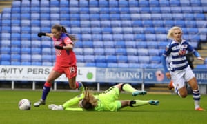 Fran Kirby of Chelsea Women goes round Grace Moloney of Reading Women and scores.