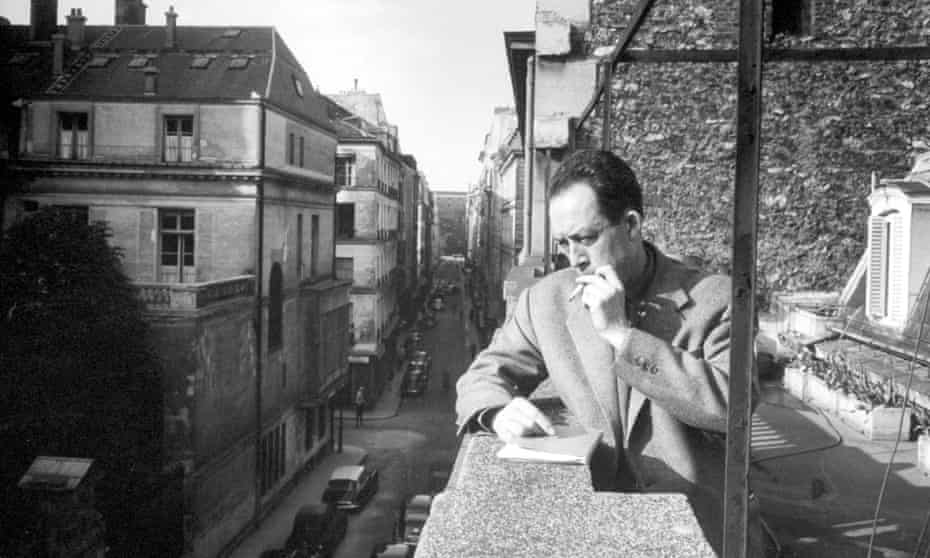 Waiting it out ... Albert Camus on the balcony at Gallimard, his publisher’s office, in Paris in the 1950s.