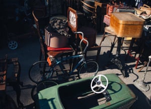 Toy cars, bicycles, pushchairs and cases on display at Udelka, flea market, St Petersburg