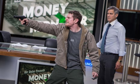 One of the little people ... Jack O’Connell, left, and George Clooney in Money Monster.