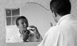 Australian cricket captain Richie Benaud shaving in his hotel room on 5 June 1961 while in Britain for the 1961 Test series. 