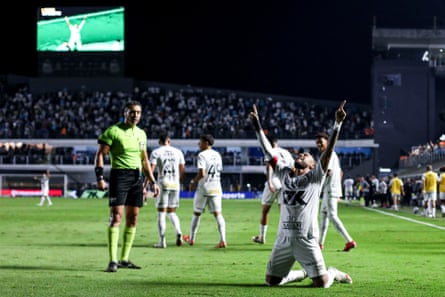 Neymar celebrates after scoring for Santos against Flamengo in July.