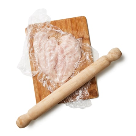 Put one butterflied breast between two sheets of clingfilm and, using a meat tenderiser or rolling pin, gently bash it out to about ½cm thick, taking care not to create any holes in the meat in the process. Season both sides well, then repeat with the second breast.
