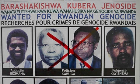 A wanted poster in Kigali with Félicien Kabuga’s face crossed out.