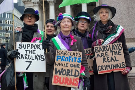 Women dressed as suffragettes demonstrate in support of the Barclays seven, January 2023.