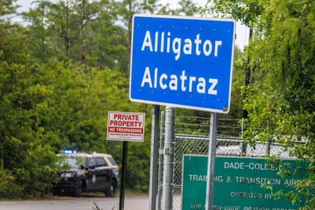 A sign reads ‘Alligator Alcatraz’