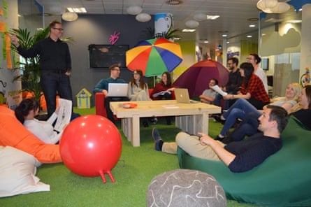 An office with space hoppers, astroturf and bean bags