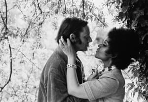 Jazz composer John Dankworth and singer and actress Cleo Laine under a tree, June 1970