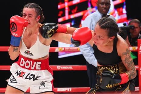 Nat Dove (left) and Maria Micheo trade punches during their flyweight bout on Friday night at the Theater at Madison Square Garden.