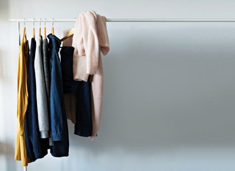 Clothes hanging on clothing rail
