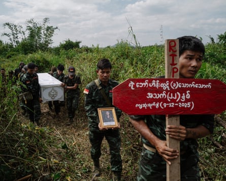 Members of the resistance carry the coffin of one of their comrades