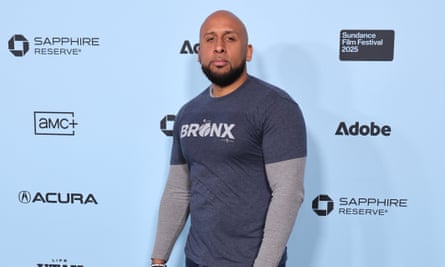 A younger man in a Bronx T-shirt.