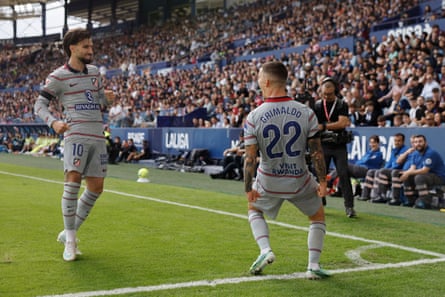 Atlético Madrid’s Alex Grimaldo (right) celebrates after opening the scoring against Levante