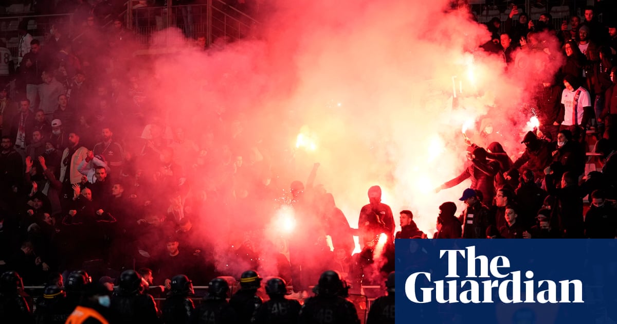 Lyon’s French Cup tie abandoned as rival supporters fight and invade pitch