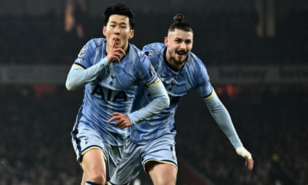 Son Heung-min celebrates his goal with Radu Dragusin