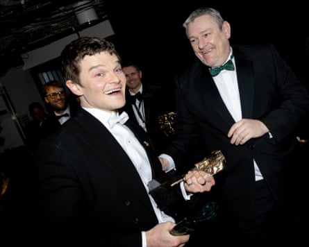 Apology … John Davidson, right, backstage with best actor winner Robert Aramayo, who portrays him in the film I Swear.