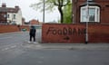 Graffiti points towards a local food bank in Harehills, one of the most deprived areas of Leeds