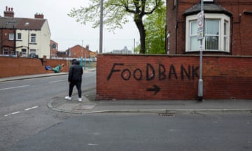 Graffiti points towards a local food bank in Harehills, one of the most deprived areas of Leeds