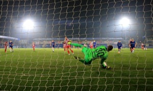 Ann-Katrin Berger of Chelsea saves a penalty from Deyna Castellanos of Atlético Madrid