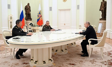 Russian president Vladimir Putin, Chinese defence minister Li Shangfu, and Russian defence minister Sergei Shoigu attend a meeting in Moscow