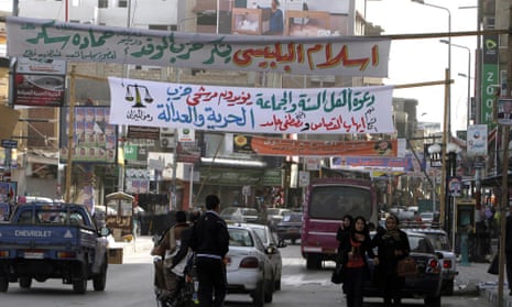 Electoral banners hang across a street in al-Arish Mohammed Abed/AFP/Getty)