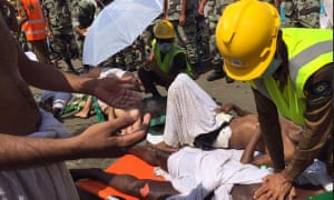 Rescuers attend to people injured in the stampede during the hajj.