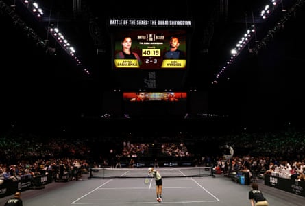 Nick Kyrgios serves to Aryna Sabalenka on the unusually sized court