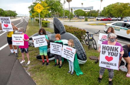Activists from PETA and Animal Hero Kids protest to demand freedom for Lolita.