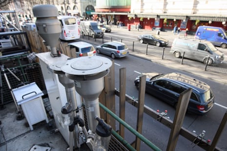 Traffic drives past air quality monitoring equipment on Marylebone Road in London, England