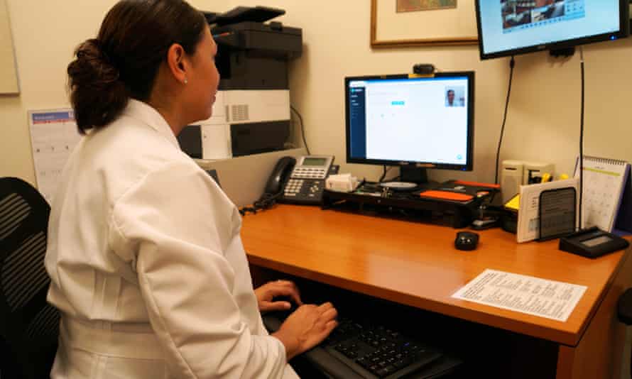 Dr Esther Priegue demonstrates the technology that will allow Choices Women’s Medical Center to counsel patients who receive abortion drugs through the mail.
