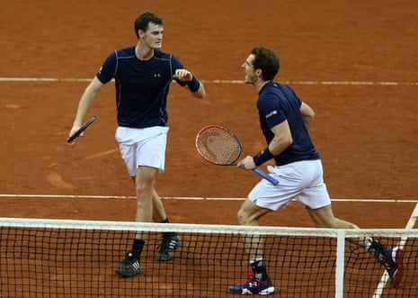 The Murray brothers celebrate taking the first set.