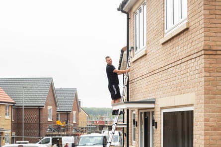 Orlando Murphy at work as part of professional snagging company New Home Quality Control, checking new-build houses for faults