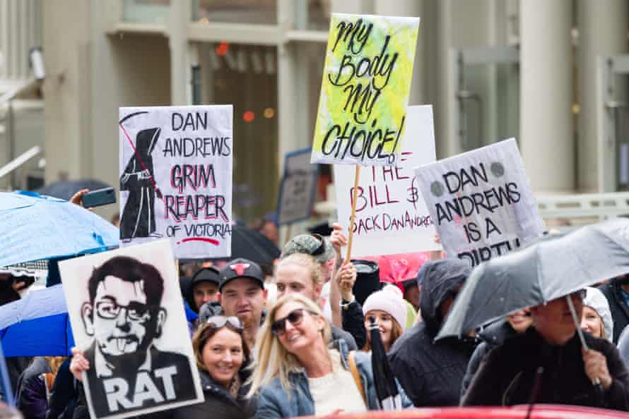 Protesters march in the central business district of Melbourne, Australia.