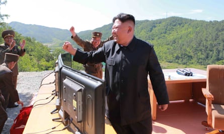 North Korean leader Kim Jong-un reacts during the test-fire of intercontinental ballistic missile.
