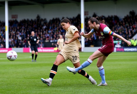 Sam Kerr in action with Aston Villa's Danielle Turner.