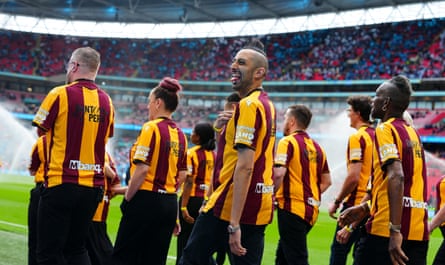 Bradford City choir walk along the touchline at Wembley.