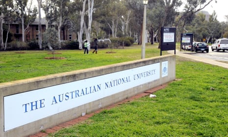 University students walk through the grounds at the Australian National University in Canberra
