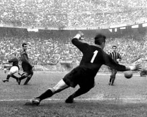 Greaves (left) fires the ball past Internazionale’s goalkeeper Lorenzo Buffon, to score Milan’s second in a 3-1 win over their local rivals in October 1961. Greaves scored nine goals in 14 appearances for the Rossoneri