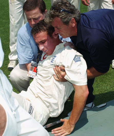 Simon Jones of England is carried from the field after injuring his leg.