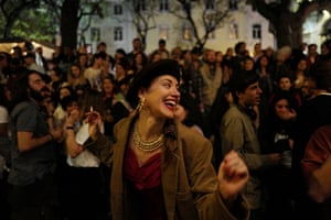 A woman dances in Carmo square, Lisbon as Portugal prepares to celebrate the 50th anniversary of the 1974 Carnation Revolution