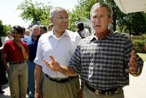 President George W Bush and Powell stop to talk to the press outside a Crawford, Texas restaurant