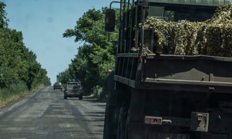 Artillery ammunition is seen in the back of a truck near Velyka Novosilka.