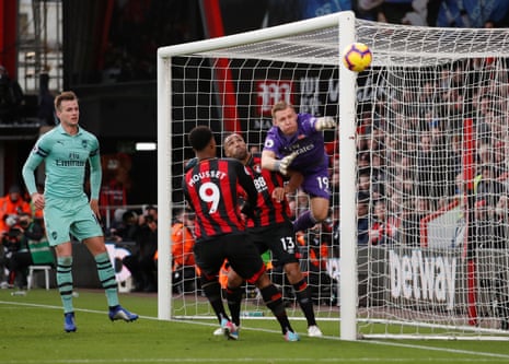 Arsenal’s Bernd Leno claws the ball away