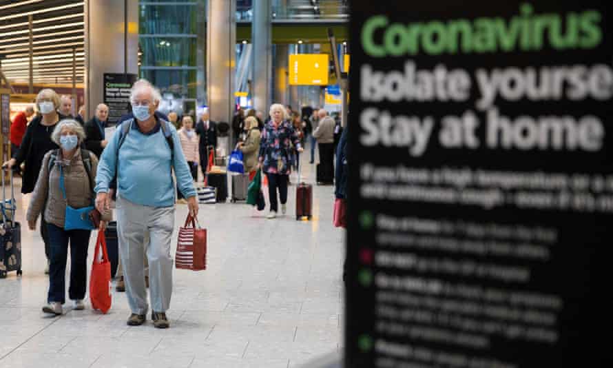 Passengers at Heathrow airport, London, March 2020