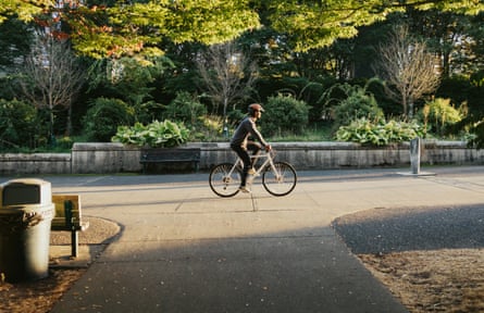 A Cyclist Riding Bike in City Setting