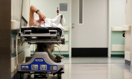 A patient waits in the hallway at Ben Taub general hospital.