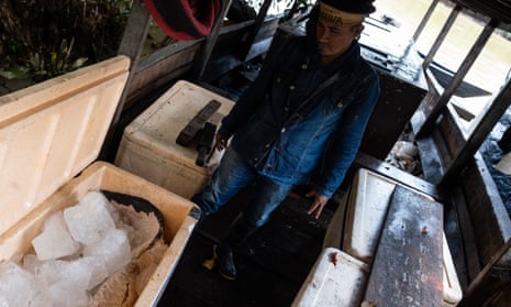 A boat, said to be Pelado’s, filled with pirarucu fish, that was seized by EVU and police.